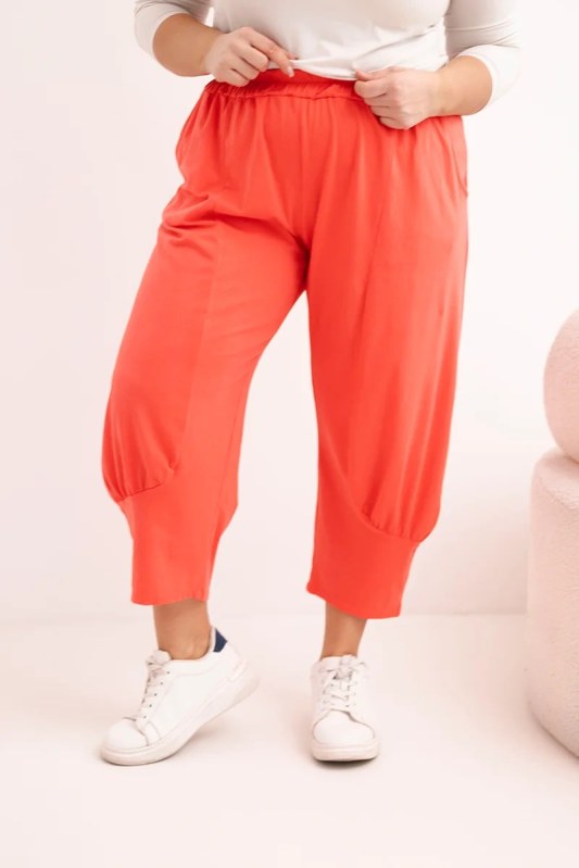 Dámské kalhoty Plus Size s&nbsp;nízkým sedem a&nbsp;gumou v&nbsp;pase korálové - Dámské oblečení kalhoty