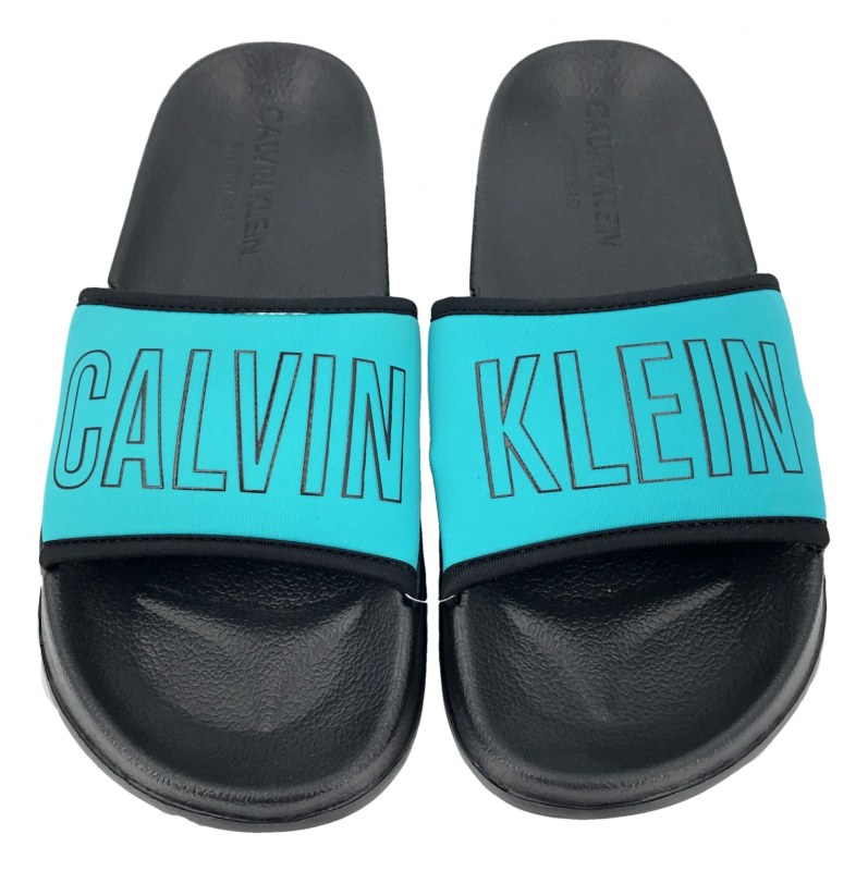 Plážové pantofle KW0KW00728 tyrkysová - Calvin Klein - Dámské oblečení plavky plážové oblečení a doplňky