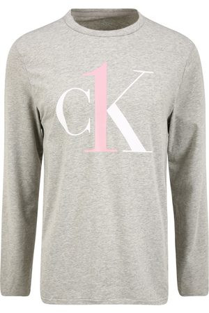 Pánské tričko NM2017E PGK šedá - Calvin Klein - Pánské oblečení oblečení