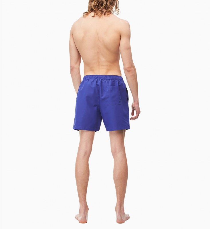 Pánské plavecké šortky KM0KM00403-CDT fialová - Calvin Klein - Pánské oblečení plavky