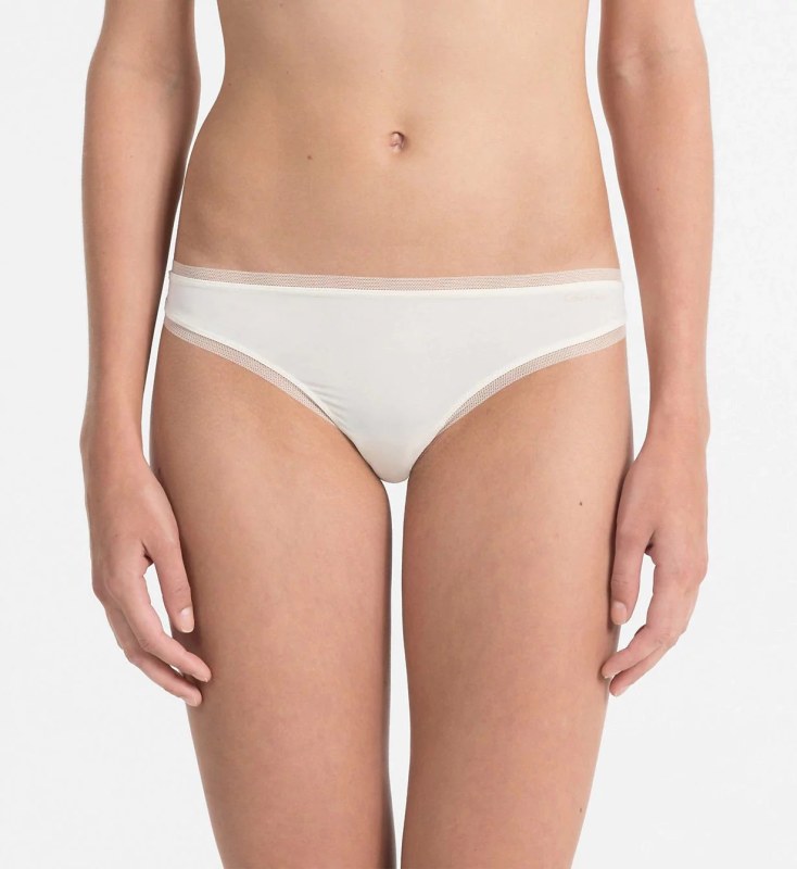 Tanga QF1666E slonovinová - Calvin Klein - Dámské spodní prádlo kalhotky a&nbsp;tanga tanga