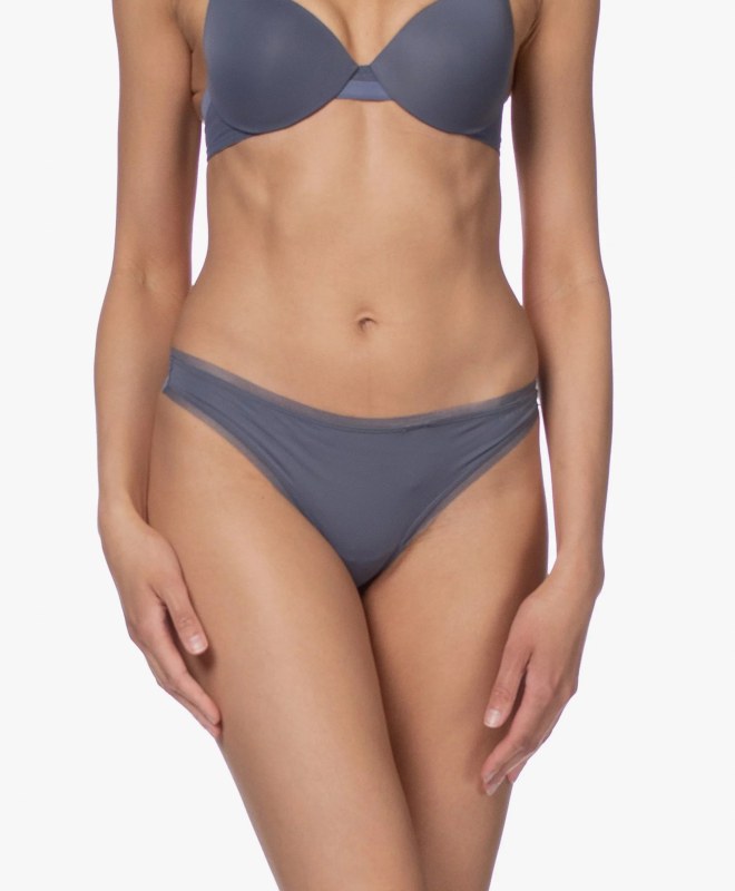 Tanga QF1666E-CDQ šedá - Calvin Klein - Ženy Dámské spodní prádlo tanga