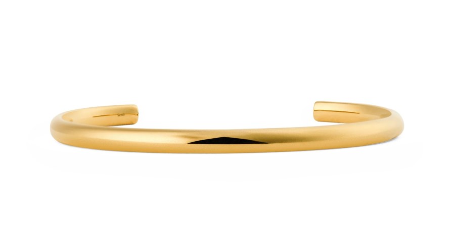 Daniel Wellington Elegantní otevřený náramek z pozlacené oceli Arch DW0040198 18,5 cm